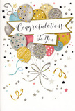 In this image, a tall congratulations card is shown upright, its design capturing the feeling of standing in the middle of a cheerful celebration on a bright day in Hanwell. The front is filled with a generous cluster of balloons rising from the lower edge and drifting toward the top, each balloon overlapping the next to create a full, abundant display. The colours are delicate yet festive: shimmering gold, silver, and champagne mingle with soft sky blue, pale pink, and muted grey, giving the impression of a stylish, grown-up party rather than loud primary tones. Many balloons are decorated with tiny clusters of stars, fine glitter stripes, or scattered confetti dots, suggesting touches of sparkle that would catch and reflect light, like afternoon sunshine glinting off shop windows along Boston Road. A smooth, ivory banner curves across the middle of the balloon bouquet, carrying the message Congratulations To You in elegant, looping script that feels both friendly and refined, as though personally handwritten for the recipient. Around the central design, wisps of curling ribbons twist and turn, while small gold and silver stars float across a light, gently textured background, giving the sense of movement and excitement-like confetti slowly falling after a toast at a celebration near Brent Lodge Park. The overall impression is one of joy, pride, and affectionate admiration. As a florist who often sends cards alongside flowers for same-day delivery in Hanwell, I see this design as perfect for graduations, promotions, new jobs, or any occasion when you want to say, with a bit of sparkle, You did brilliantly, and we're so happy for you.